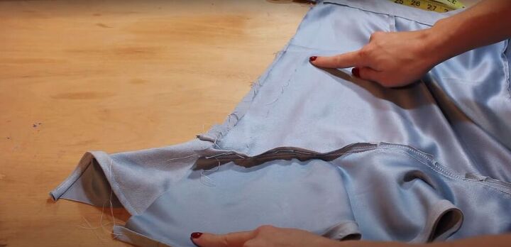 how to make a fabulous a line skirt out of an abandoned curtain, Sewing the side seams of the skirt