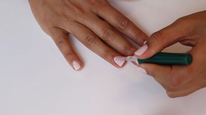 follow this manicure diy tutorial for amazing salon quality nails, Applying the top coat