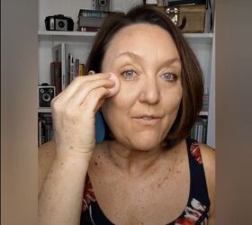 how to cover up sun spots with makeup tutorial for mature skin, Pressing a damp sponge onto my face