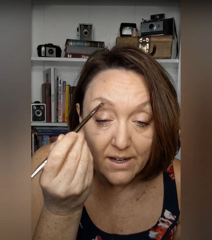how to cover up sun spots with makeup tutorial for mature skin, Filling in my eyebrows with the contour color