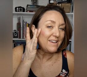 how to cover up sun spots with makeup tutorial for mature skin, Applying blush to my cheeks with my finger