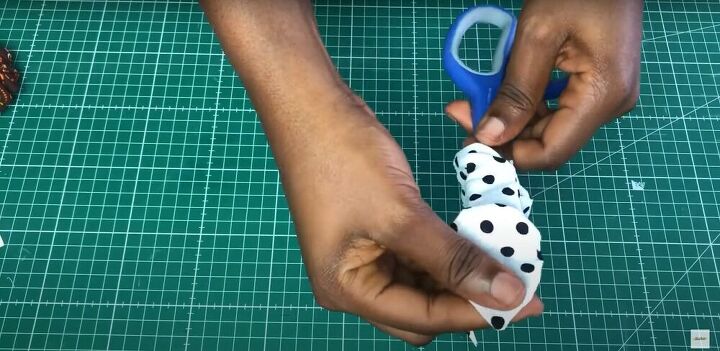 3 cute easy ways you can sew a scrunchie, pushing the corners of the fabric with scissors