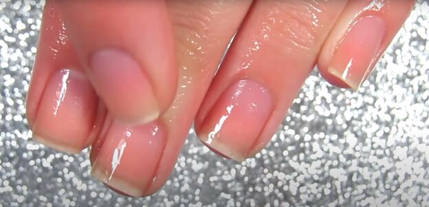home remedy to make nails grow faster stronger in just 1 week, Massaging oil into the nails