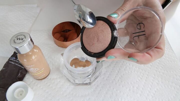this diy tinted moisturizer is a quick easy way to use up old makeup, Scraping highlighter with a spoon