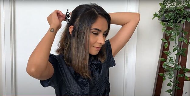 how to style a lob 6 easy long bob hairstyles, Clipping hair at the back of the head