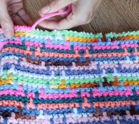 this astonishing diy crochet dress was actually made from old blankets, Clean finishing the fabric edge with a knotting technique