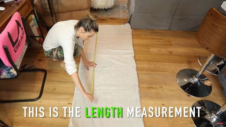 these stunning diy wrap pants look so chic in the summer, Measuring the length of the pants on the fabric
