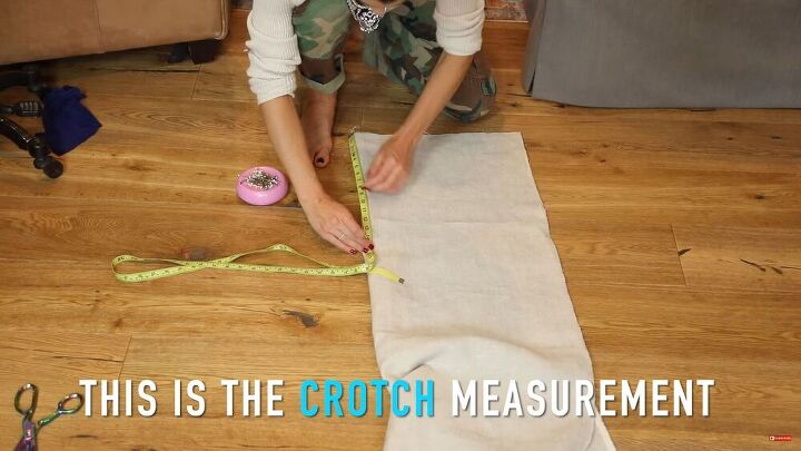 these stunning diy wrap pants look so chic in the summer, Measuring the crotch on the fabric