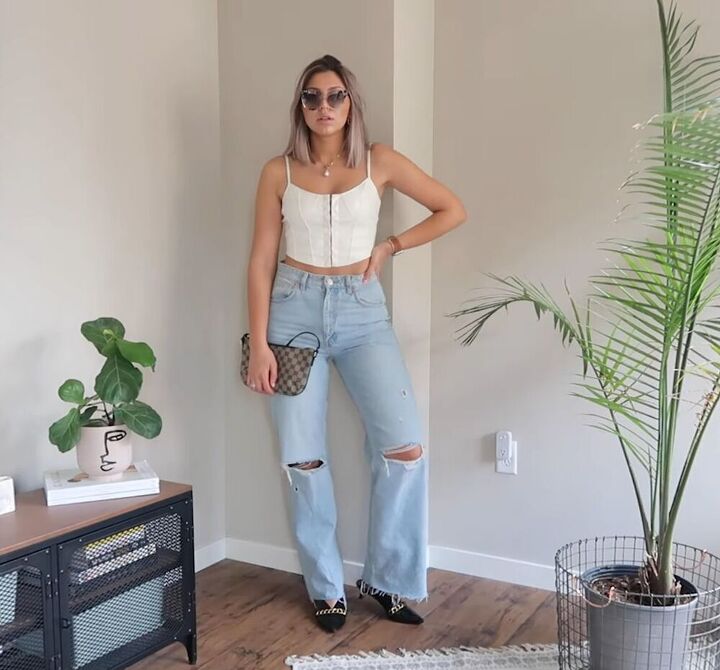 7 summer pants outfits that show off the season s latest trends, Distressed jeans with a corset top