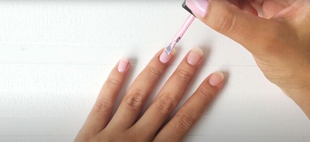 easy at home manicure how to cure gel nail polish with an led light, Applying gel nail polish to nails