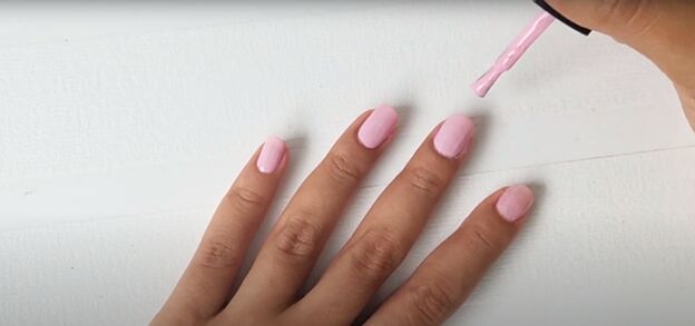 easy at home manicure how to cure gel nail polish with an led light, Applying a second coat of gel nail polish