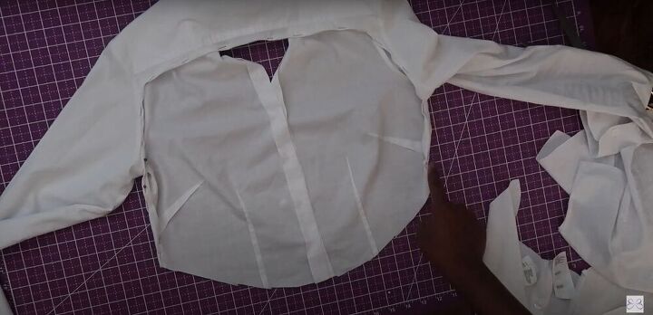 this diy button up crop top is super sexy really easy to make, Pinning the raw edges on the shirt