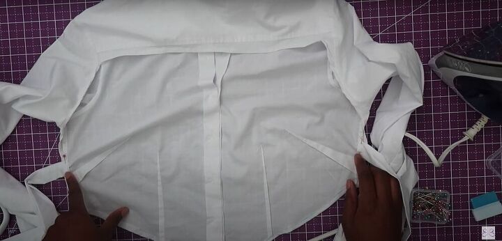 this diy button up crop top is super sexy really easy to make, Pinning the straps to the button down shirt