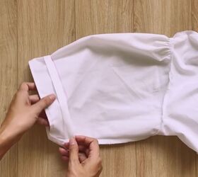 make this cute puff sleeve crop top out of an old men s shirt, Inserting the fabric onto the sleeve
