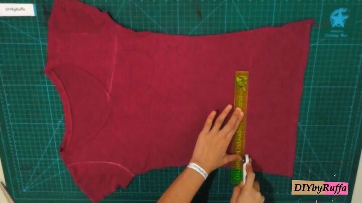 how to make a funky diy patchwork top from two old t shirts, Cutting the t shirt with a rotary cutter