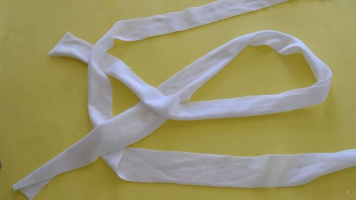 how to make a headband 3 cool ways to make a fabric headband, Making a Celtic knot with fabric