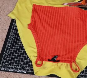 how to easily make a diy gym tank top out of old workout clothes, Using a crop top as a pattern