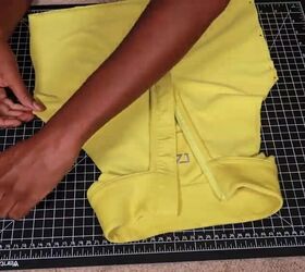 how to easily make a diy gym tank top out of old workout clothes, Pinning the raw edges