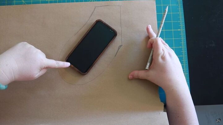 how to sew hidden pockets into absolutely anything sneaky tutorial, Using a smartphone to test the pocket size