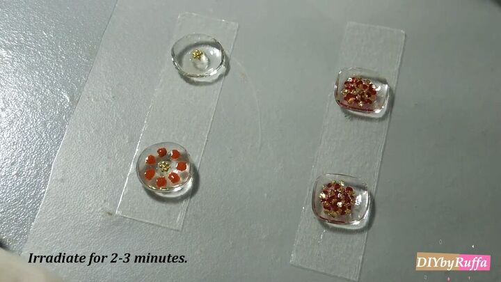 have you tried making resin earrings check out this diy tutorial, Adding flower petal designs to the earrings