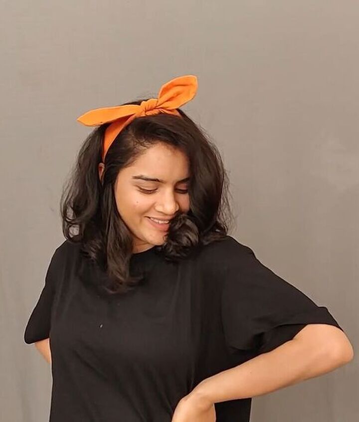 make a diy cropped jacket headband from your dad s old shirt, Tying the headband into a bow