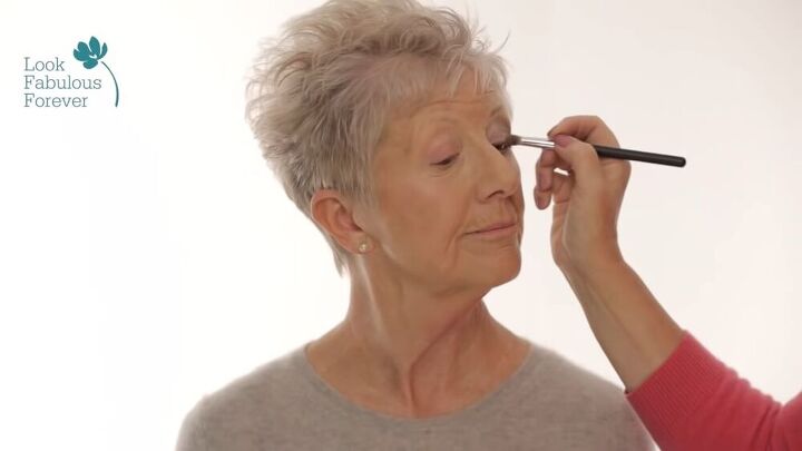 enhancing lip eye makeup for women over 60, Applying dark matte eyeshadow to the socket