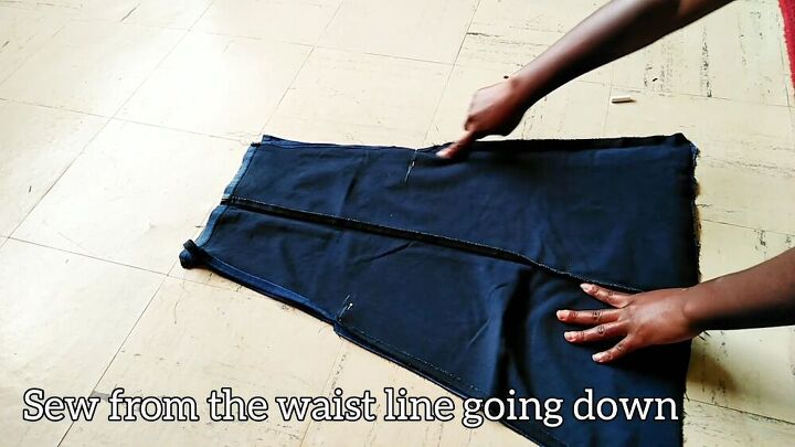how to easily make a dungaree dress from old jeans, Pinning and sewing the waistline of the dress