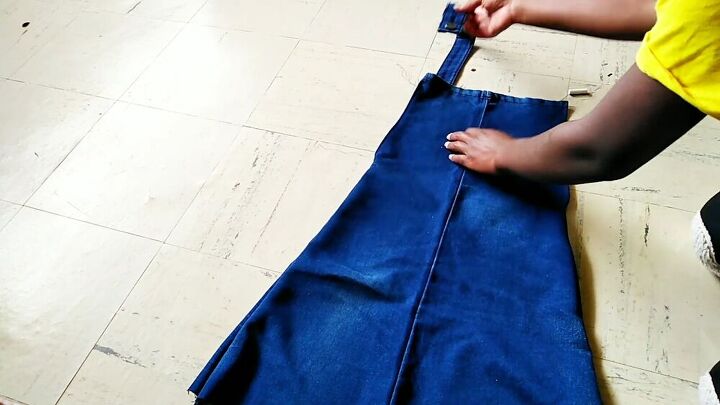 how to easily make a dungaree dress from old jeans, Attaching the straps to the dungaree dress