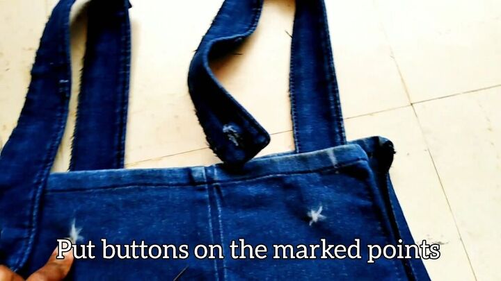 how to easily make a dungaree dress from old jeans, Marking the button placement with chalk