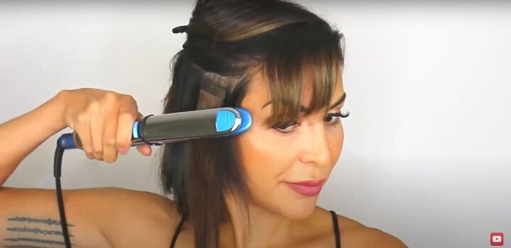 how to use tape in extensions on short hair for instant natural volume, Using a flat iron on tape in hair extensions