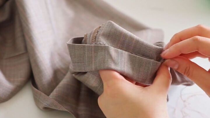 how to sew a blazer dress pants from your dad s old suit, Hand sewing the hem of the pants