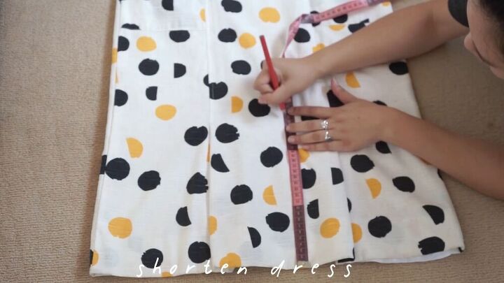 thrift flip ideas old dress transformed into a new dress cute top, Measuring where to shorten the dress