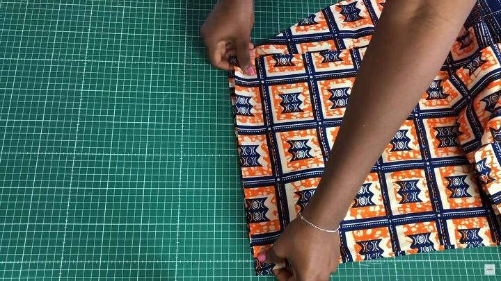 this tiered gathered skirt tutorial only requires 2 measurements, Pinning the fabric ready to sew
