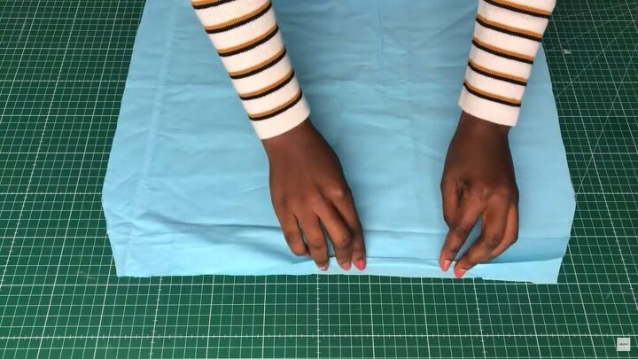 how to sew a shirred top simple step by step tutorial, Folding and pinning the sleeve edges