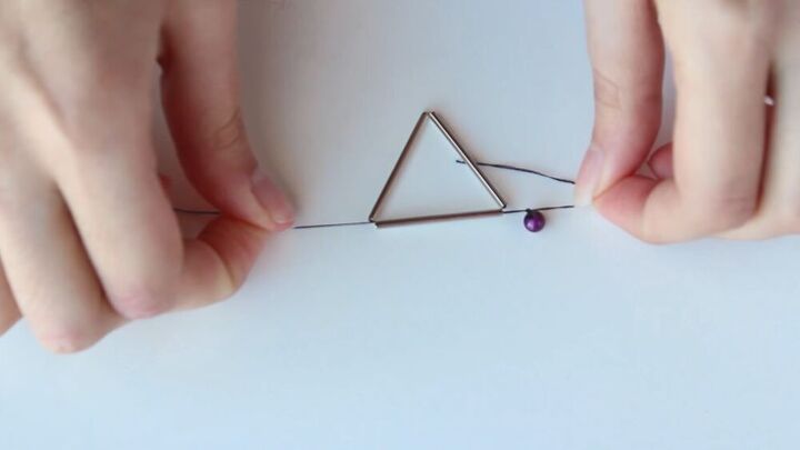 this diy geometric necklace is cool simple so easy to make, Triangle of metallic tube beads