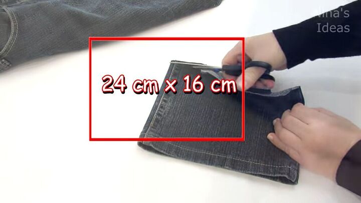 got an old pair of jeans turn them into a cute diy denim clutch, Measuring and cutting the jeans pocket