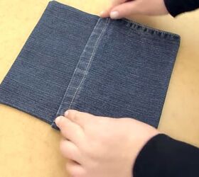 got an old pair of jeans turn them into a cute diy denim clutch, Connecting the pocket to the top flap