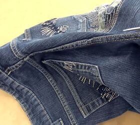 got an old pair of jeans turn them into a cute diy denim clutch, Cutting edge stitching from the jeans