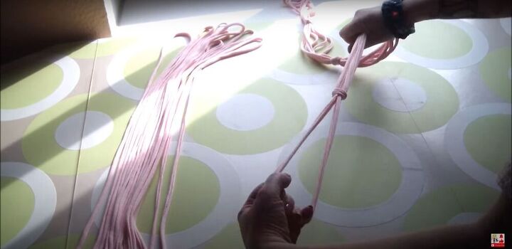 3 cool ways to make a scarf necklace out of old t shirts, Knotting the t shirt yarn