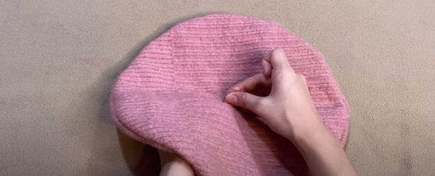 want to learn how to easily sew a beret follow these 4 simple steps, Hand sewing the tail to the beret