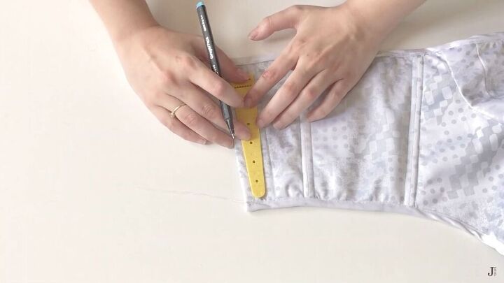 7 simple steps to sewing a corset top with boning eyelets, Marking the eyelets on the corset top