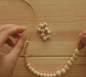 how to make this rustic vintage inspired diy beaded headband, Adding the large wooden beads