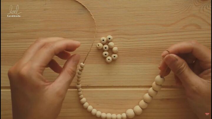 how to make this rustic vintage inspired diy beaded headband, Adding the large wooden beads