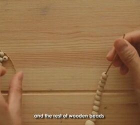 how to make this rustic vintage inspired diy beaded headband, Threading more wooden beads onto the string