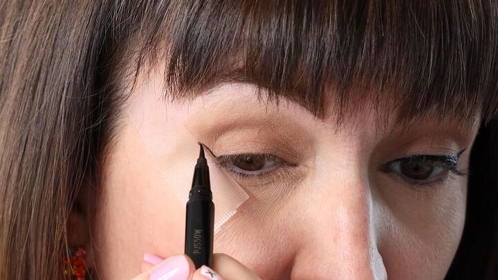 6 easy diy makeup beauty hacks that will save you money time, Creating winged eyeliner with tape