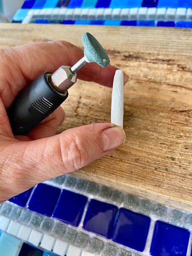 how to make a pretty pendant necklace from an old dish, Smooth edges with sander