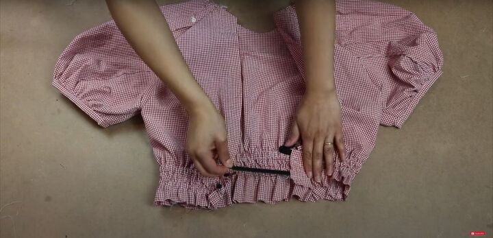 how to make a pretty strawberry blouse diy bow back top tutorial, Feeding the elastic through the casing