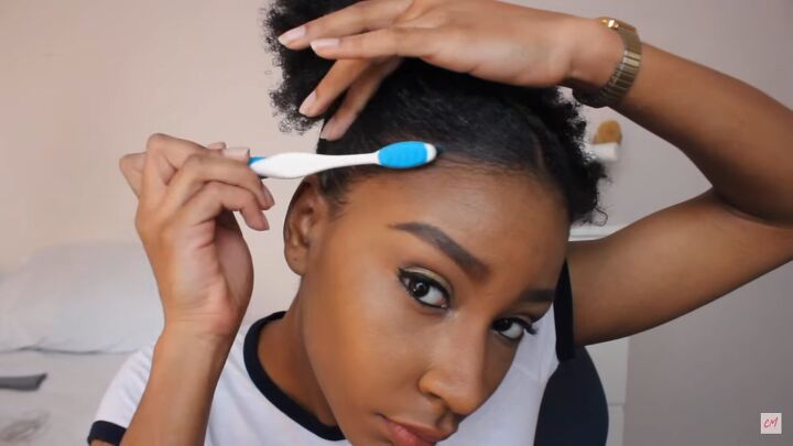 3 cute protective hairstyles for curly hair that are super easy to do, Using a toothbrush and gel to lay edges
