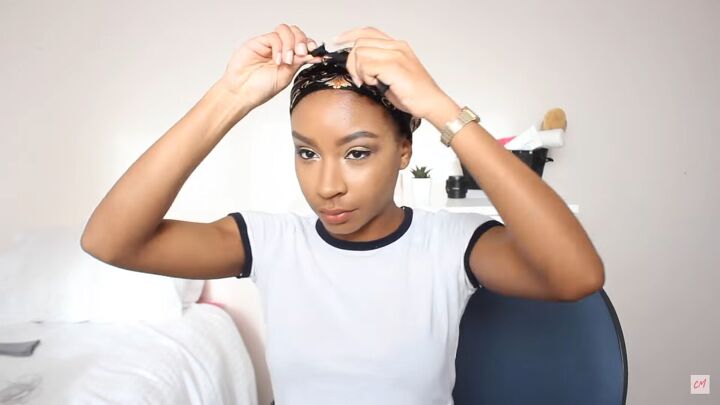 3 cute protective hairstyles for curly hair that are super easy to do, Wrapping hair in a silk scarf to set it