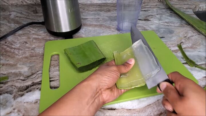 how to make aloe vera juice for hair natural leave in conditioner, Removing the aloe pieces from the skin